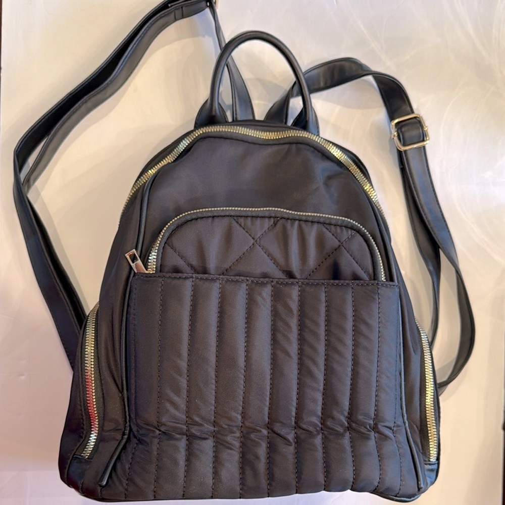 Fashion Black Quilted Backpack with Structured Design and Gold Hardware